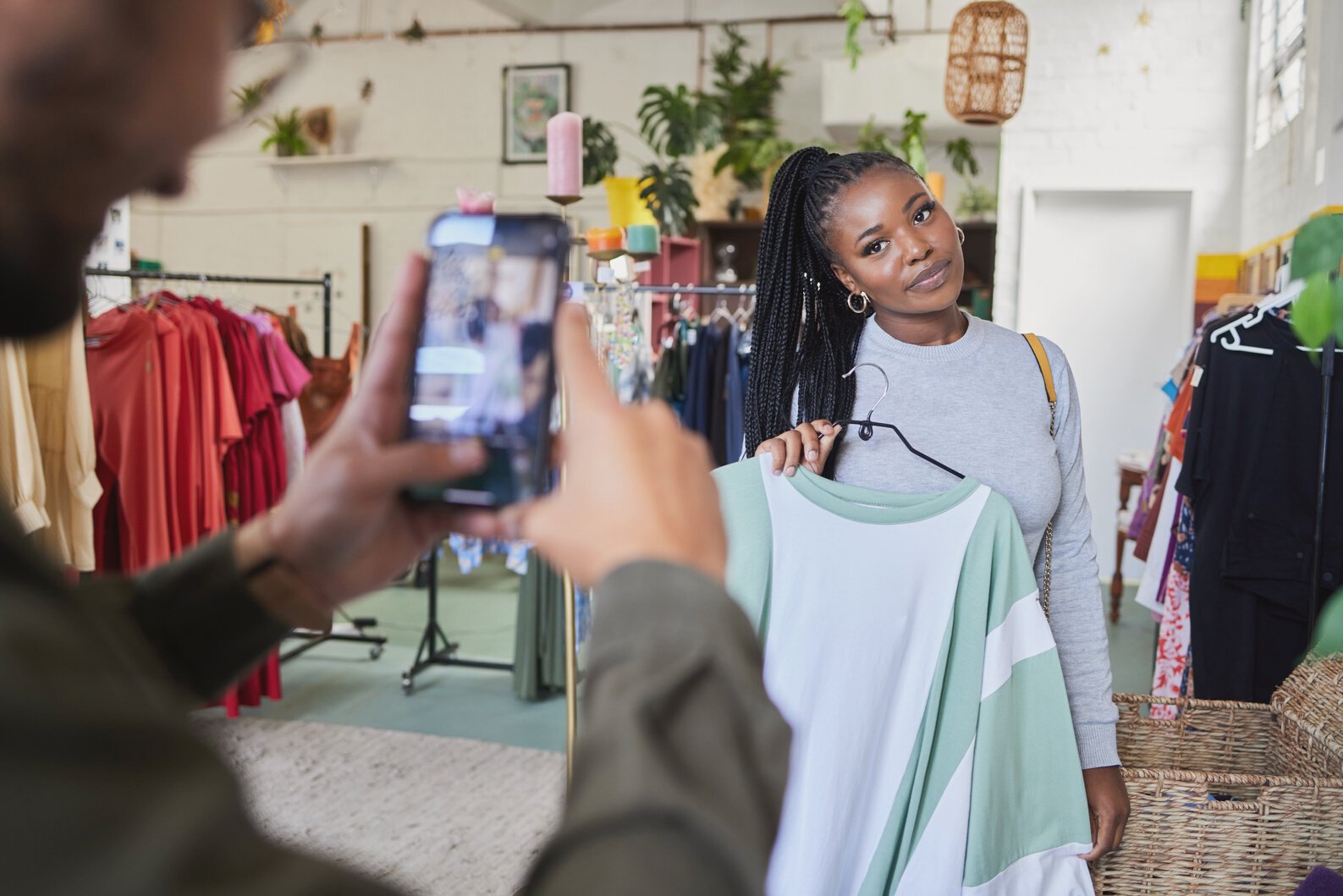 Shopping, Photography and Fashion with a Black Woman Influencer in a Clothes Store as a Brand Ambassador. Social Media, Retail or Style Blog and a Female Content Creator Posing with an Outfit